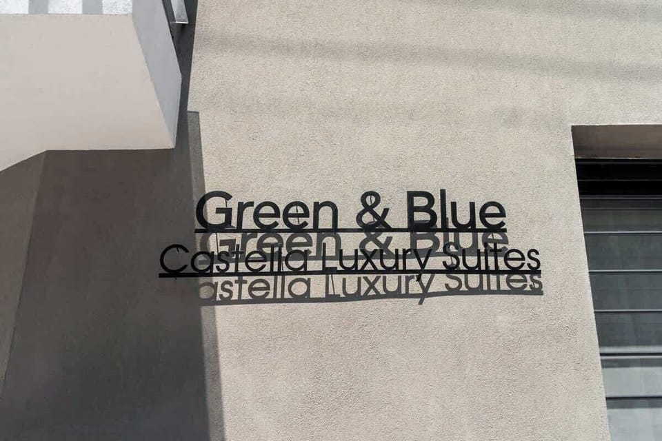 Welcome Sign at Green & Blue Castella Luxury Suites