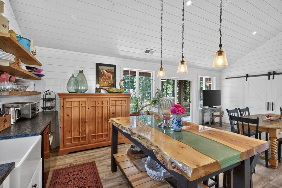Dining Area | Unique Live-Edge Table | Pendant Lighting & Patio Access