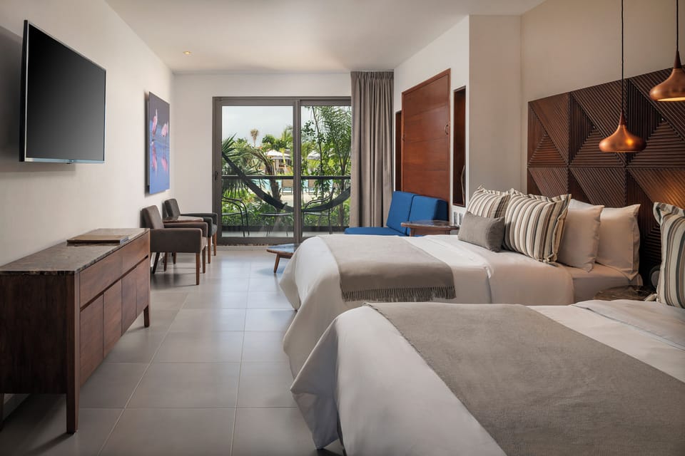 Family Room at Ventus Ha | Down comforters, minibar, in-room safe, iron/ironing board