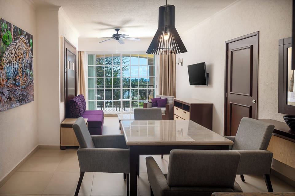 One Bedroom Suite | Down comforters, minibar, in-room safe, iron/ironing board