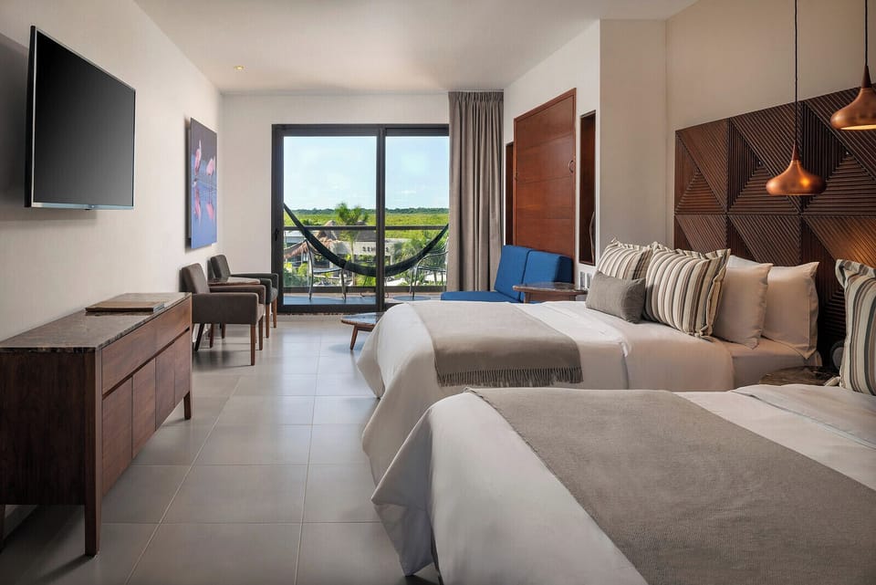 Family Room at Ventus Ha | Down comforters, minibar, in-room safe, iron/ironing board