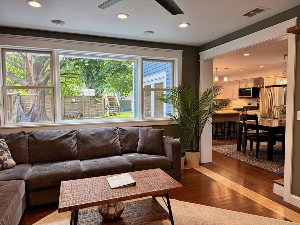 Spacious living room that flows nicely to the open dining room and kitchen