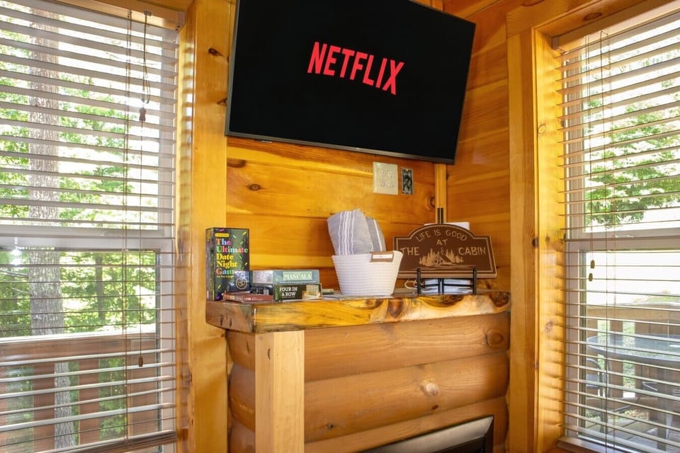 Cozy up by the fireplace and stream your favorite shows on the Smart TV