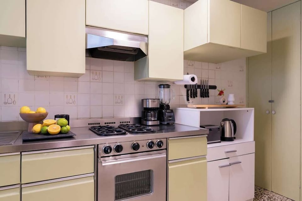 Experience the delight of culinary creations in our fully equipped kitchen, complete with essential supplies like coffee, oil, salt, pepper, and tea. Unleash your inner chef and savor every moment of preparing delicious meals with ease. 
