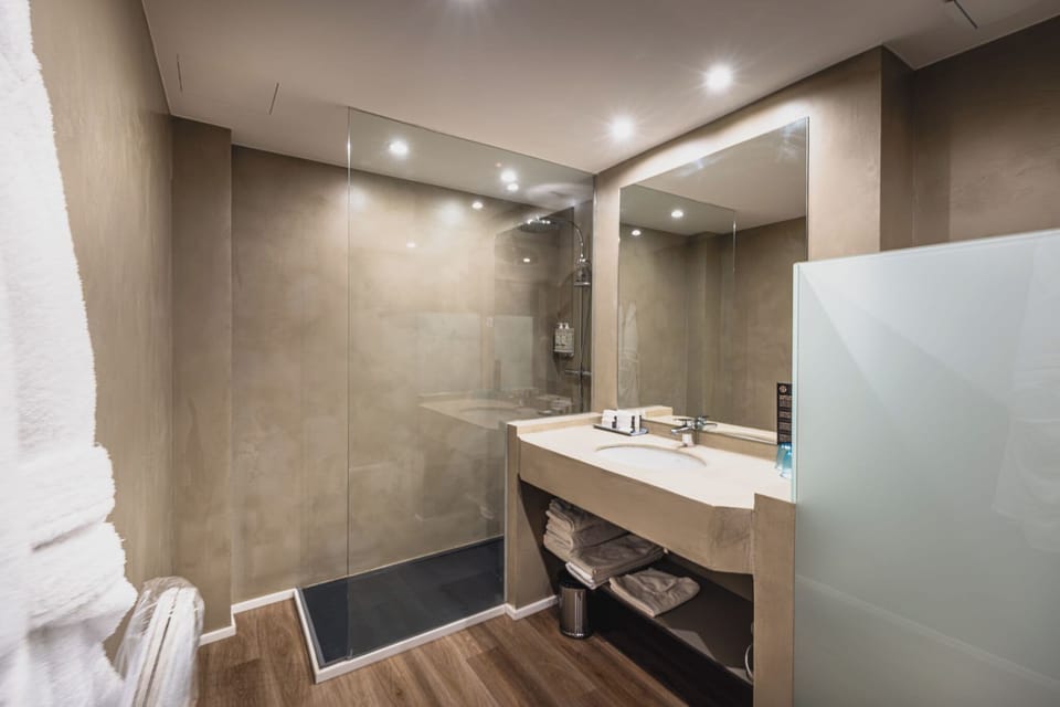 Family Triple Room, 1 Bedroom, Private Bathroom | Bathroom | Separate tub and shower, eco-friendly toiletries, bathrobes, slippers