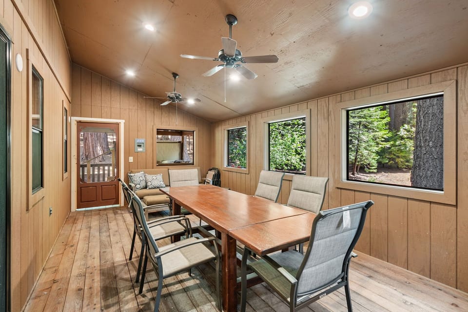  Screened-in dining area seating for 6 with peaceful forest views.