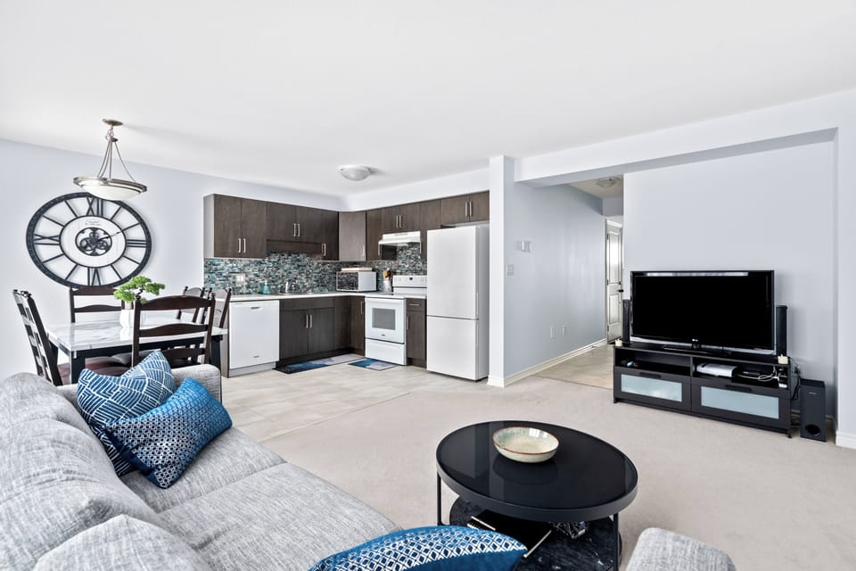 Bright open-concept living area with modern finishes