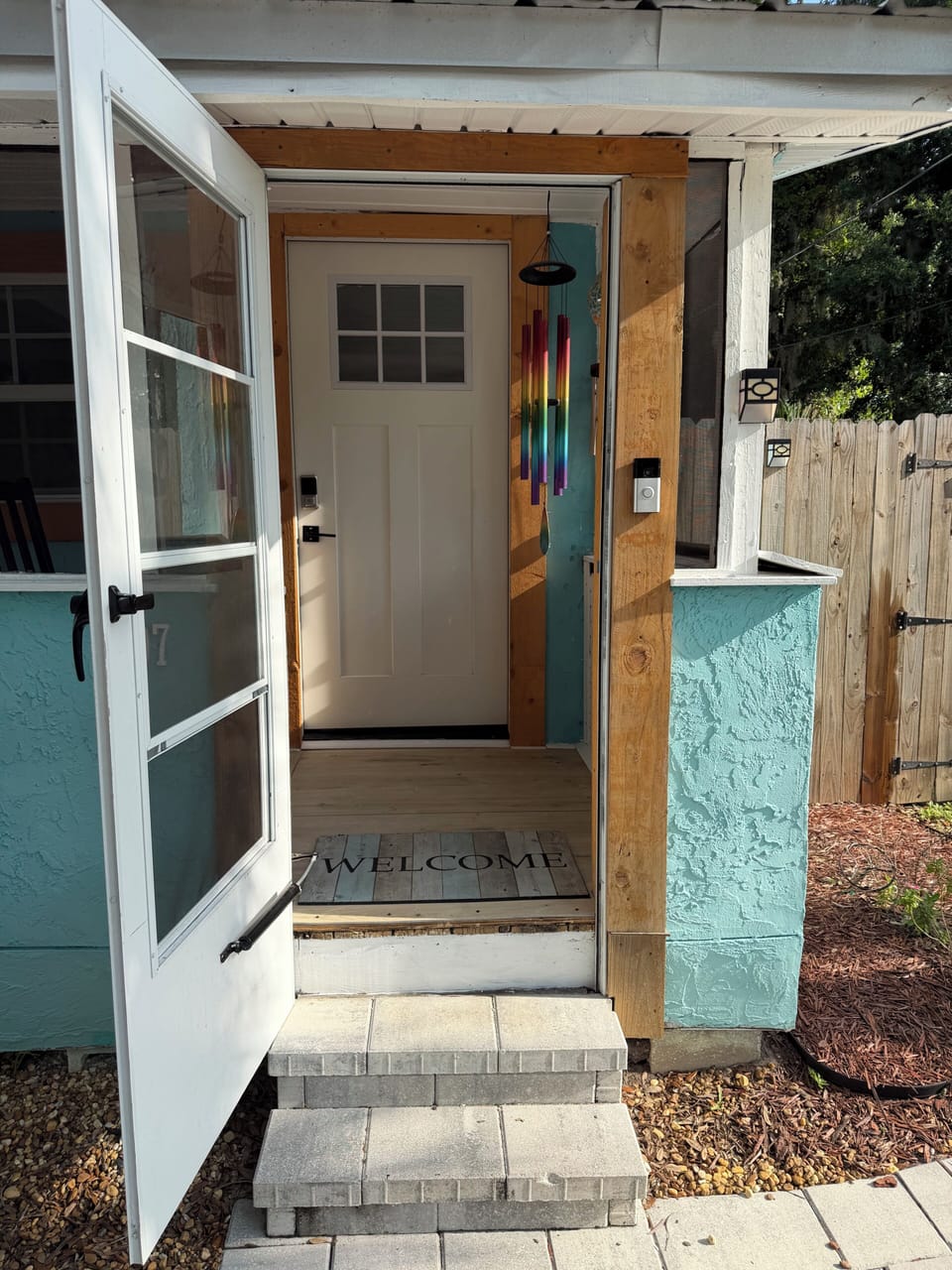 Screen porch that is great for morning coffee 