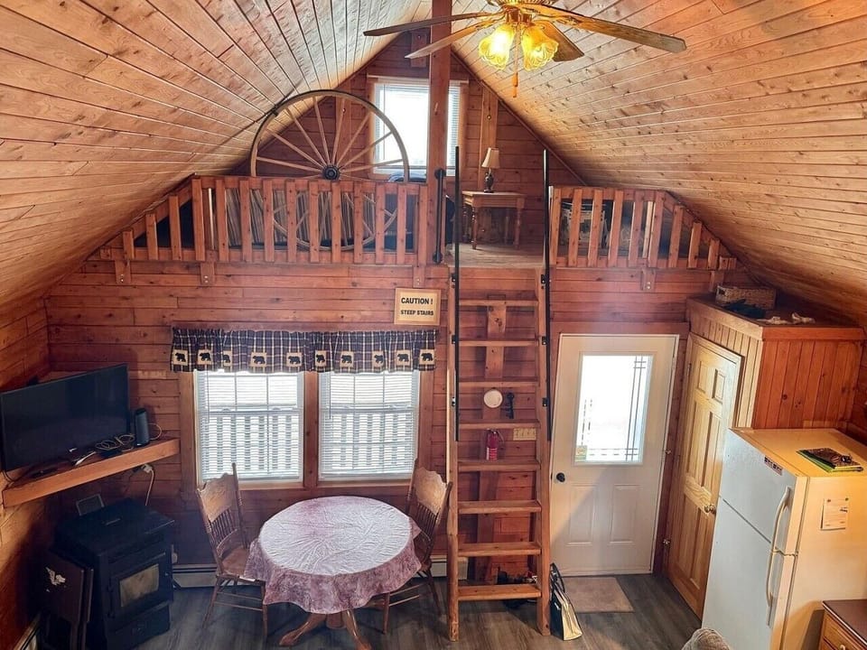Dining Nook | Round Dining Table | TV Corner & Loft Access