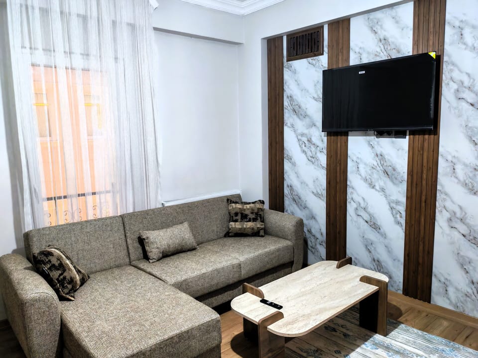 Apartment, Multiple Beds, Kitchen | Living area