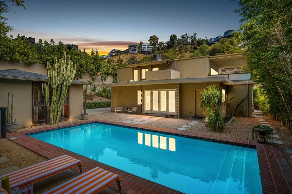 Palm Springs–style backyard with sparkling pool