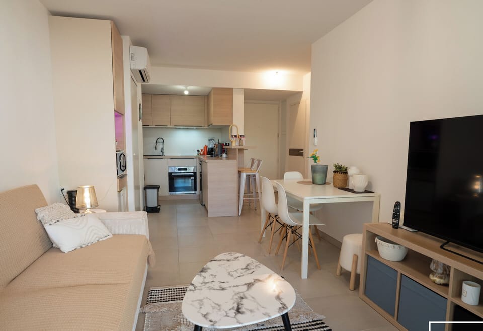 Spacious, air-conditioned living room with a sofa bed