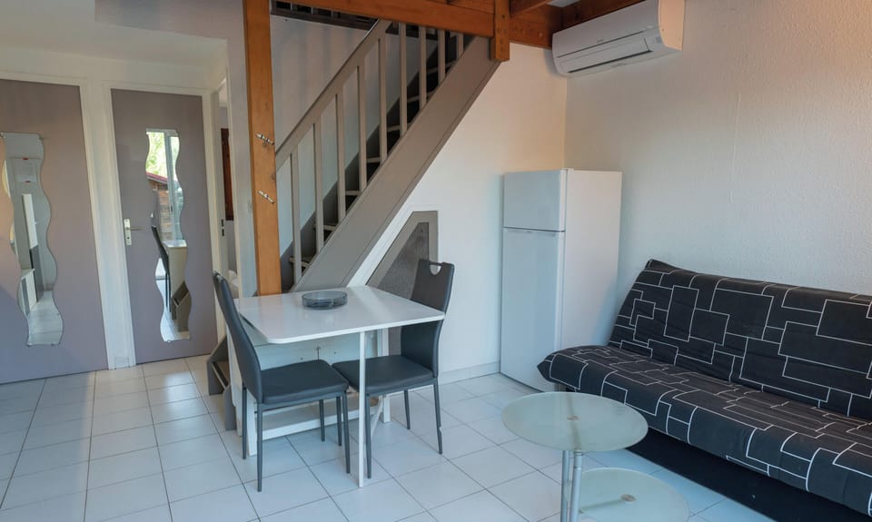 Open-plan living area with a fitted kitchen
