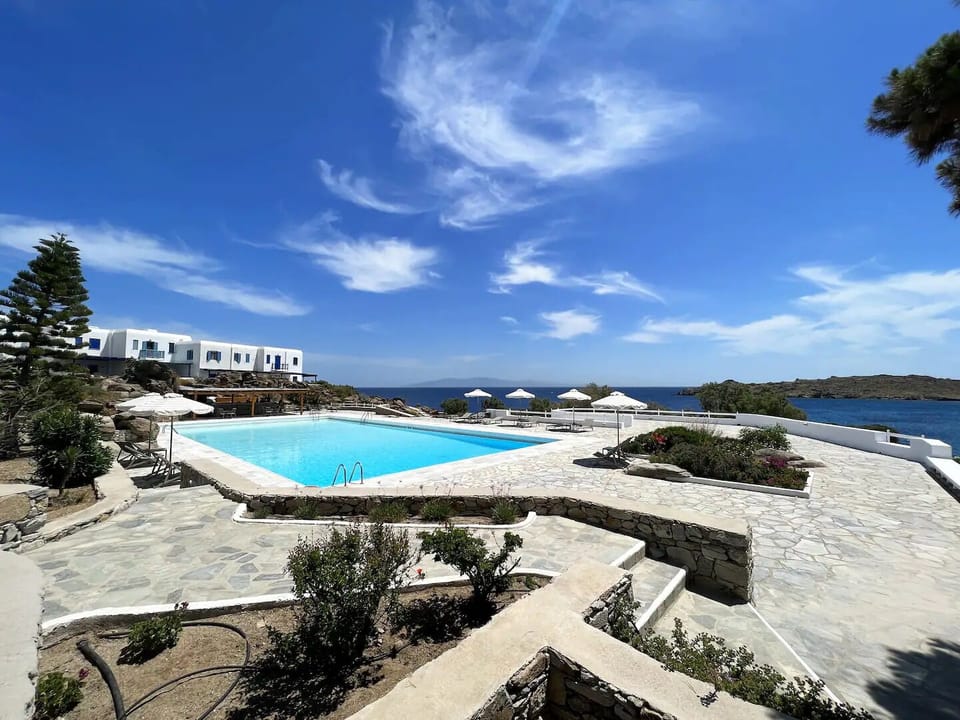 Classic Apartment, Ocean View | Pool | Seasonal outdoor pool, pool umbrellas, sun loungers