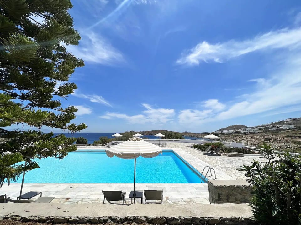 Classic Apartment, Ocean View | Pool | Seasonal outdoor pool, pool umbrellas, sun loungers
