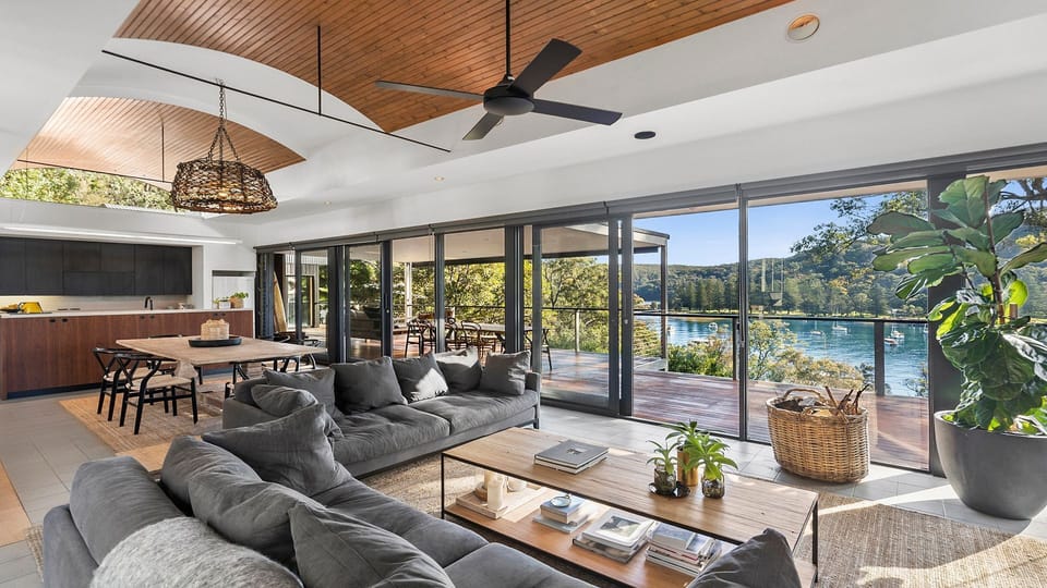Sink into comfort with water views beyond