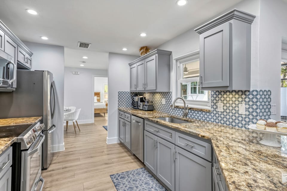 Clean, modern layout with ample counter space for meal prep.