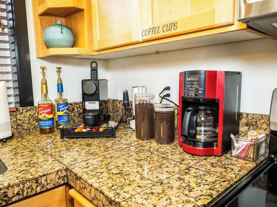 Kitchen: Brew your favorite coffee creations in the kitchen, supplied with all you could need.