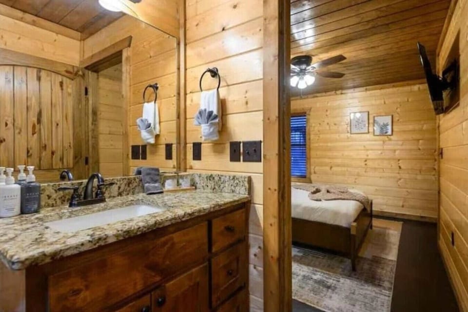 Elegant ensuite bathroom with granite vanity