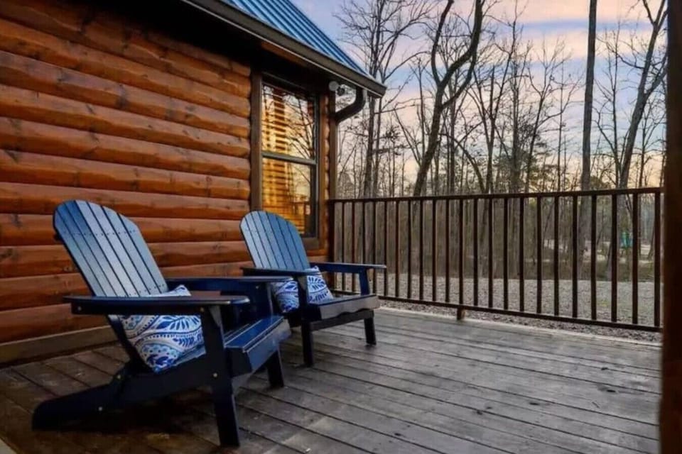 Start your morning coffee or unwind at sunset on this peaceful cabin deck.
