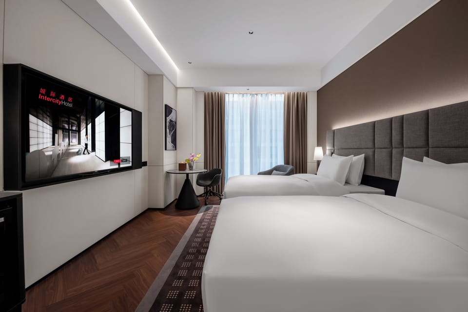 Basic Double Room, City View | Down comforters, minibar (free items), desk, laptop workspace