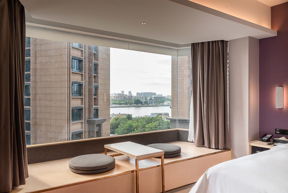 Luxury Double Room, City View | Desk, laptop workspace, blackout drapes, soundproofing