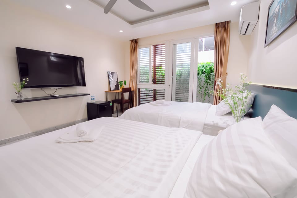 Economy Twin Room, Garden View | Iron/ironing board, free WiFi, bed sheets