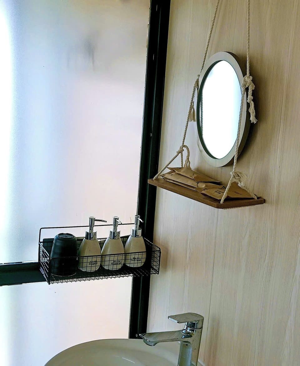 Shower, free toiletries, hair dryer, slippers