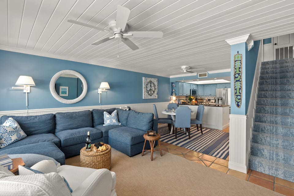 Open-concept main level effortlessly connecting the living, dining, and kitchen areas for easy entertaining.