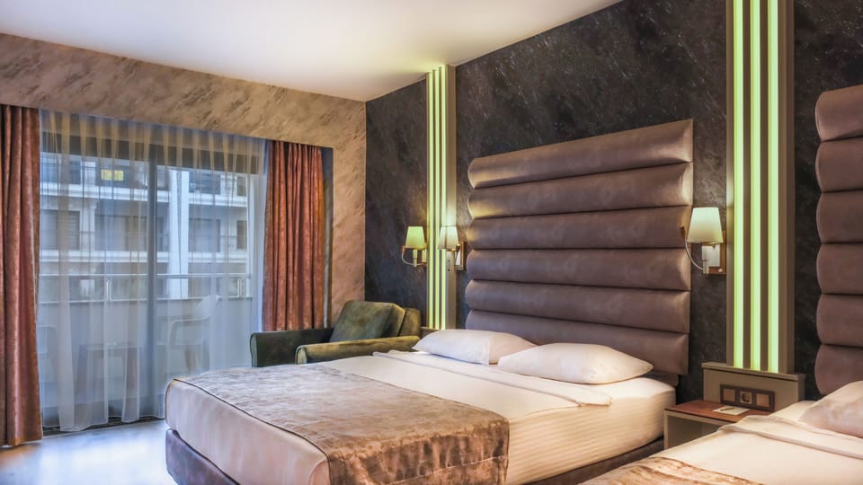 Comfort Triple Room, City View | Minibar, desk, free cribs/infant beds