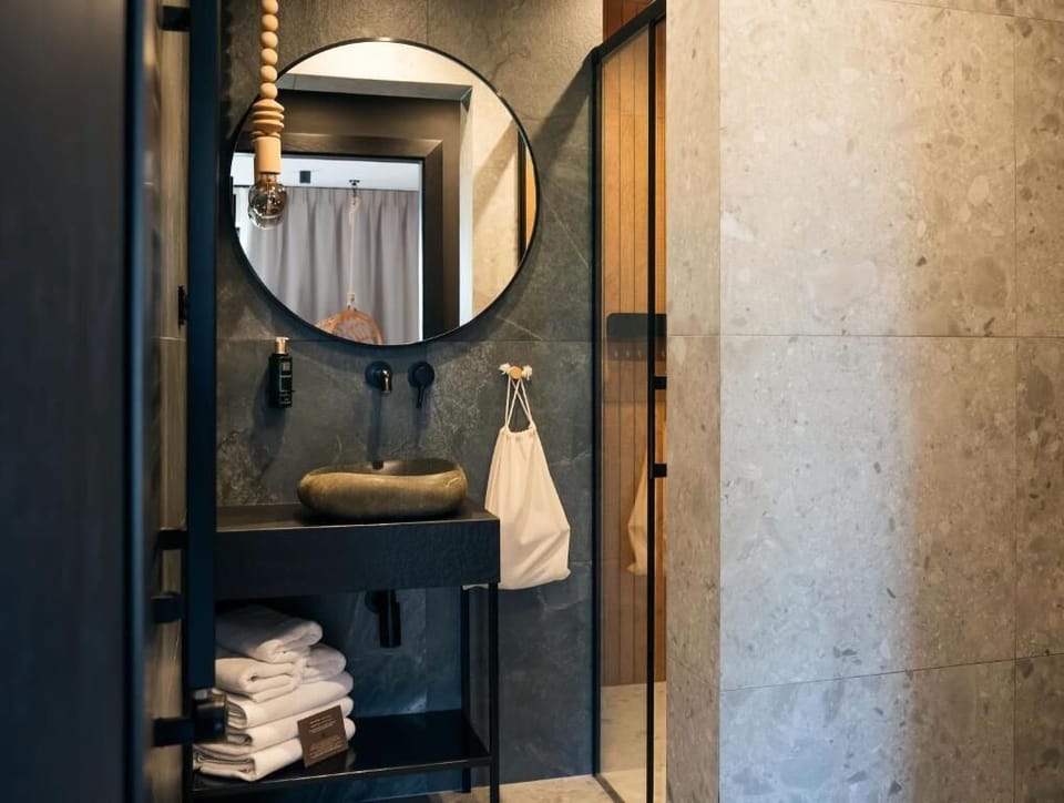 Superior Double Room, Balcony, Mountain View | Bathroom | Designer toiletries, hair dryer, bathrobes, slippers