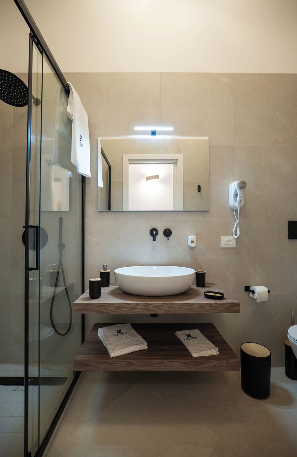 Family Apartment | Bathroom | Shower, hair dryer, slippers, towels