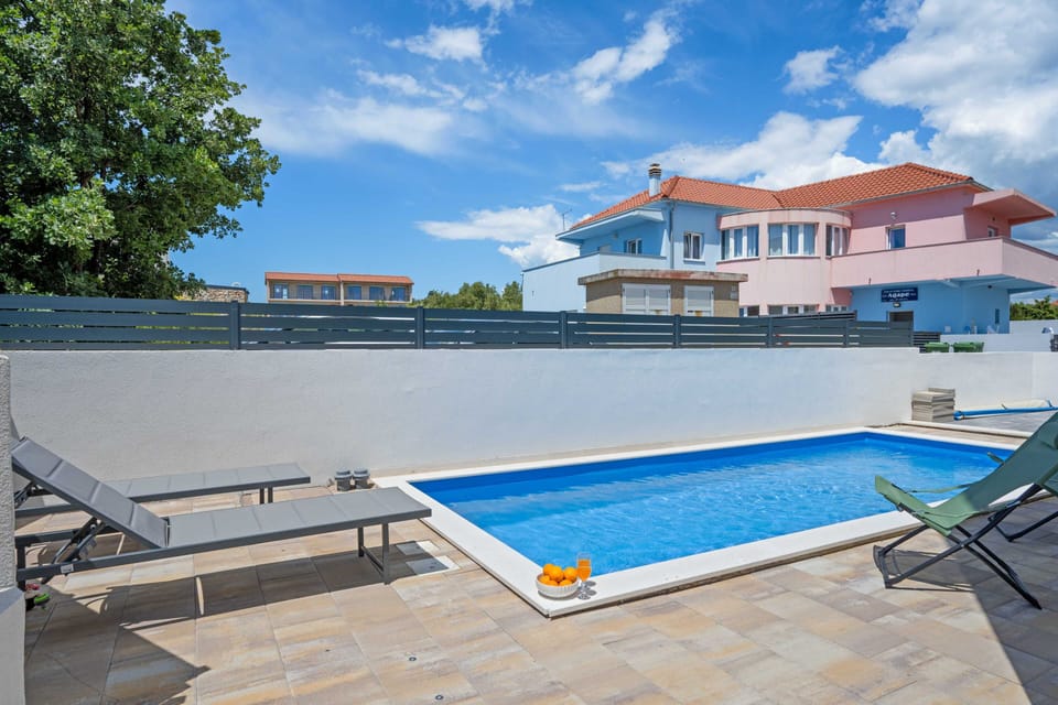 Villa (Three Bedroom Villa with Outdoor Swim) | Outdoor pool | Seasonal outdoor pool, sun loungers