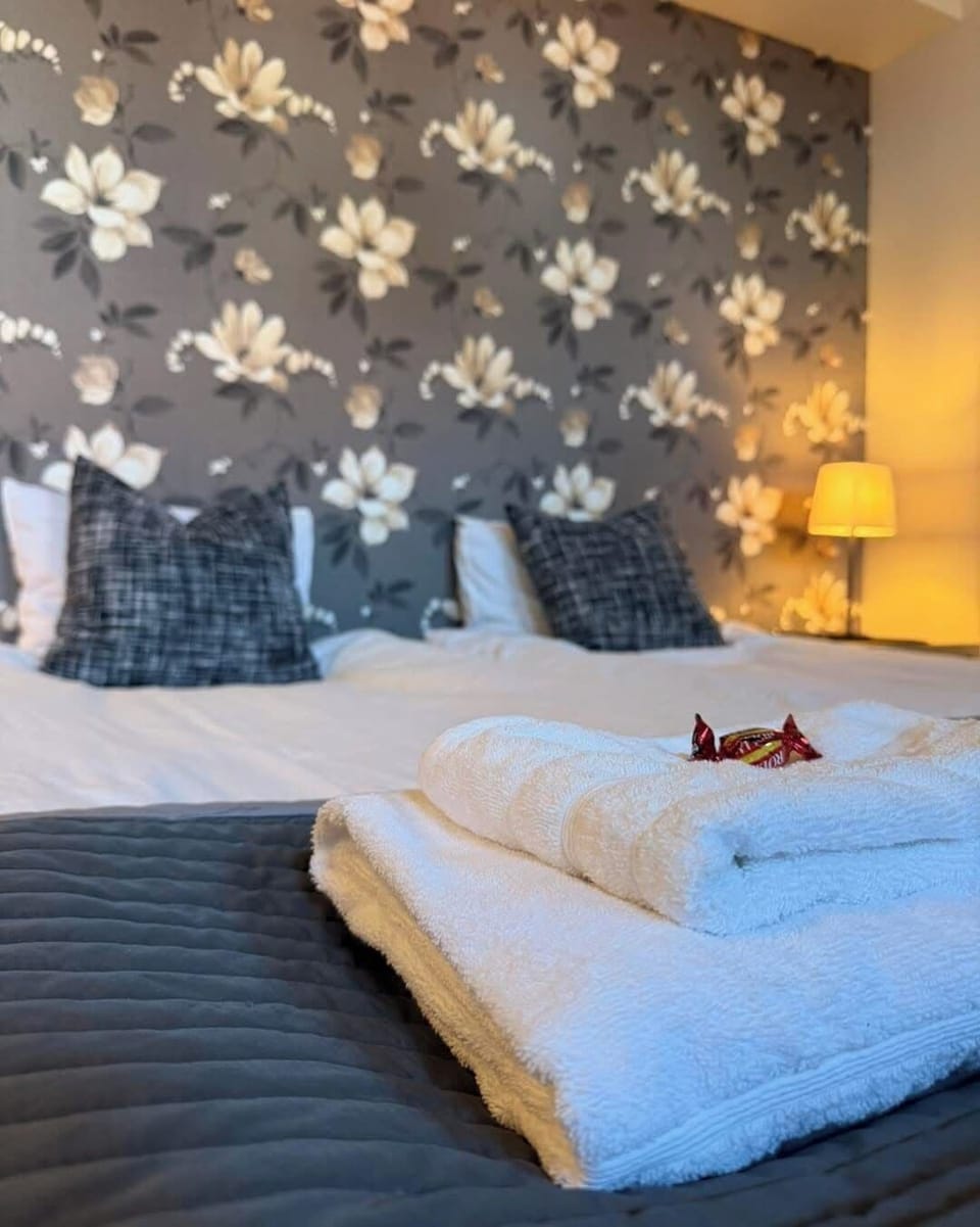 Blackout drapes, WiFi (free), bed sheets