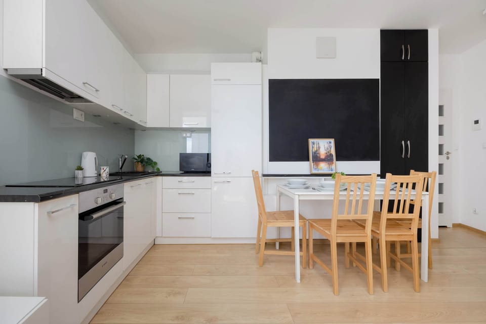 The fully equipped kitchenette includes everything you need for a home-cooked meal.