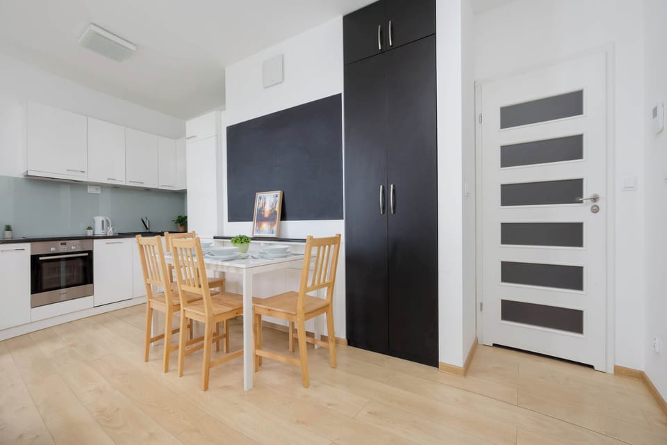 The living room has a modern look and comfortable furniture.