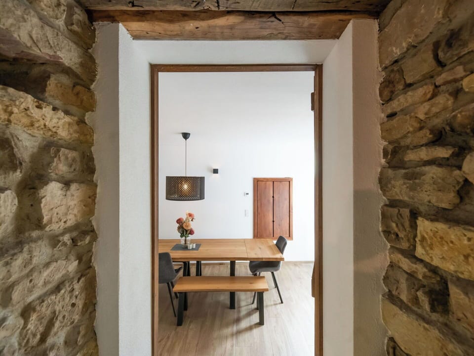 Wall, Furniture, Flooring, Wood, Interior Design, Floor, Lighting, Brown, Ceiling, Wood Flooring