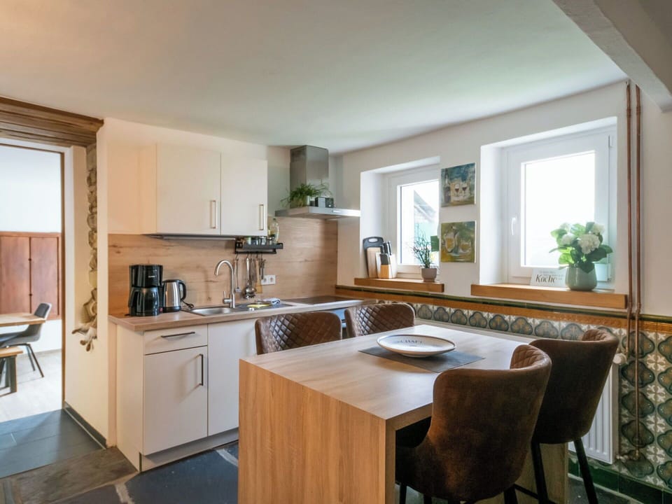 Furniture, Interior Design, Countertop, Kitchen, Flooring, Cabinetry, Kitchen Appliance, Wood, Floor, Ceiling