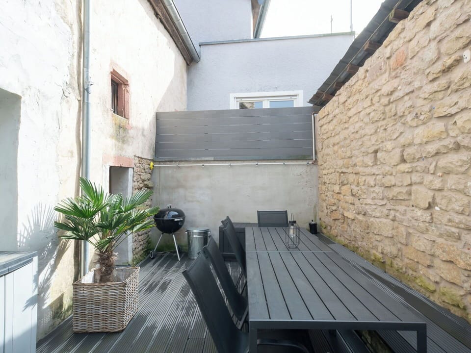 Furniture, Floor, Outdoor Furniture, Flowerpot, Chair, Houseplant, Courtyard, Balcony, Shade, Patio