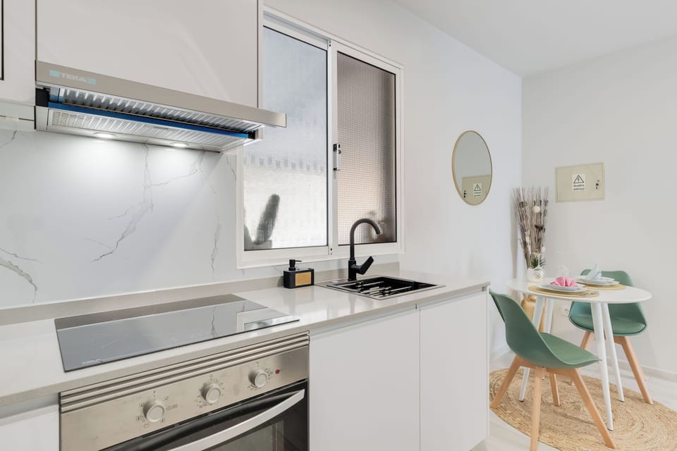 Mini-fridge, microwave, oven, stovetop