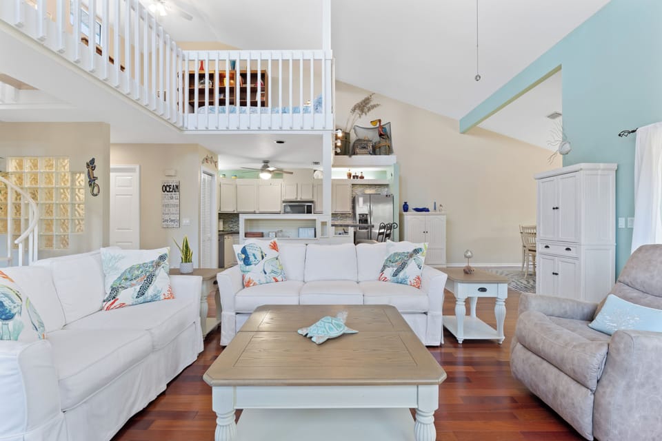 Loft Overlooks Living Room and Kitchen Area
