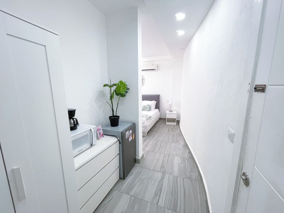 Deluxe Studio, Balcony, Resort View | In-room safe, blackout drapes, soundproofing, iron/ironing board