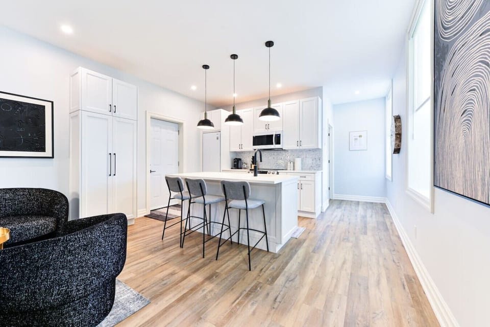 Gather around the kitchen island, perfect for morning coffee, casual dining, or planning your day in beautiful Perth. Your private apartment entrance is just steps away.