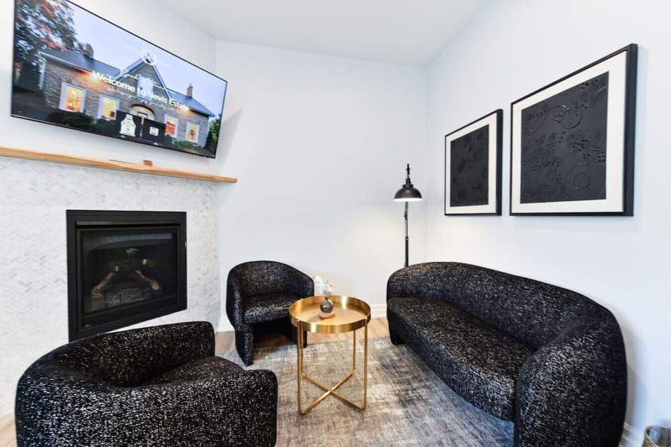 Relax in the inviting living room, featuring comfortable seating, a Smart TV, and a cozy atmosphere - perfect for unwinding after a day exploring Perth.