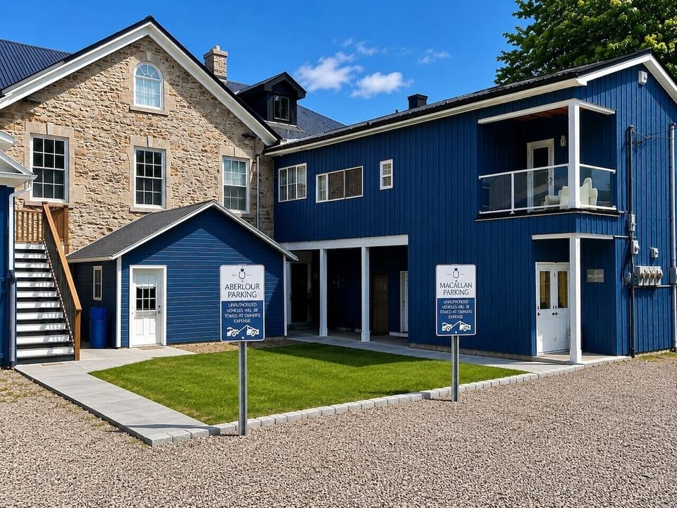 Complimentary on-site parking is included with your stay, with a reserved space conveniently located behind the building.