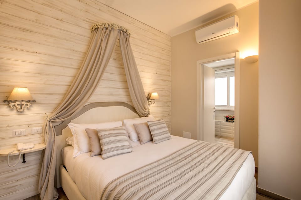 Frette Italian sheets, premium bedding, down comforters