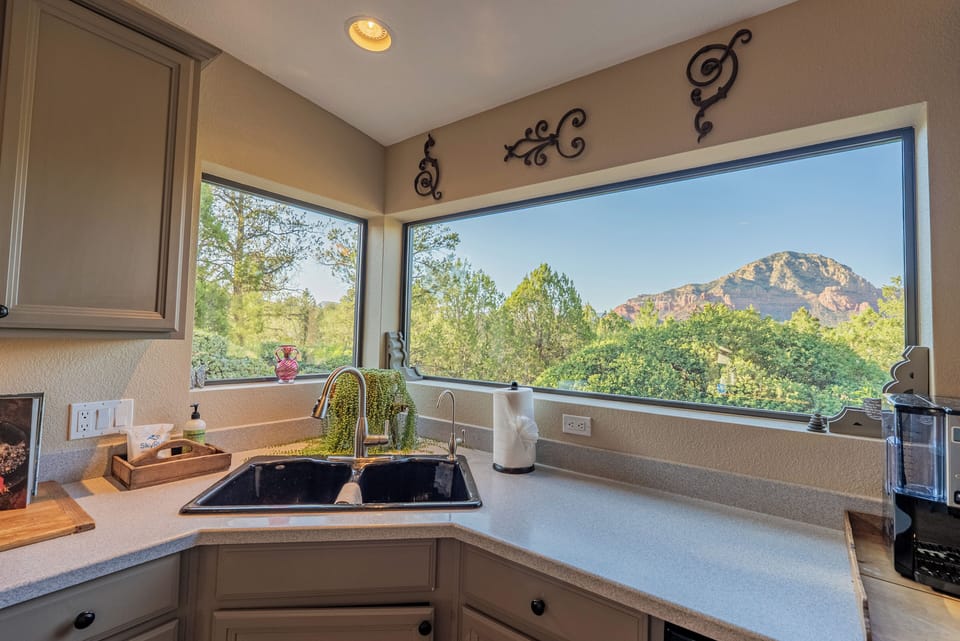 Take in breathtaking mountain views through expansive windows