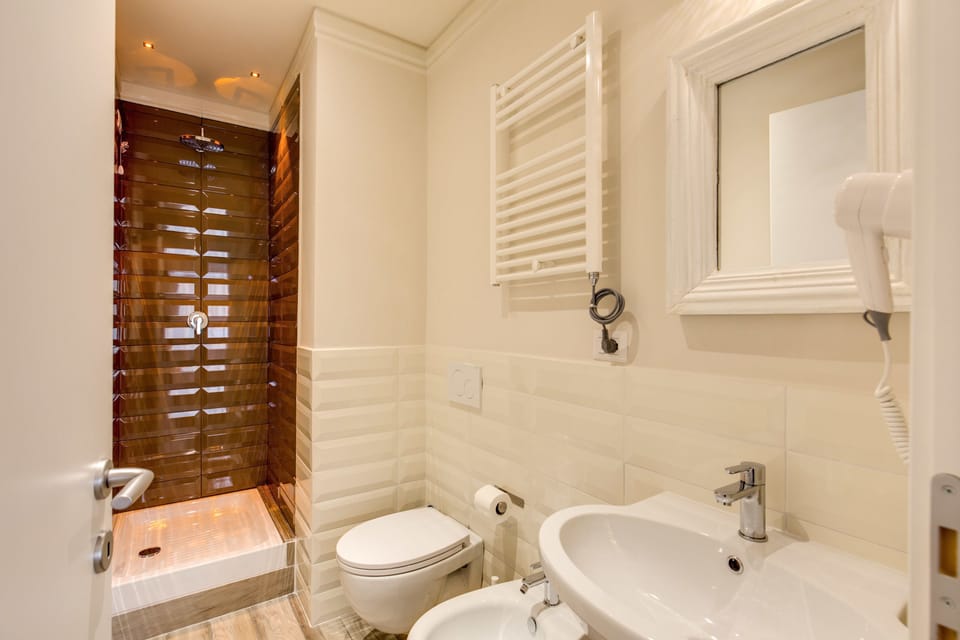 Shower, eco-friendly toiletries, hair dryer, bidet