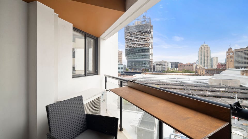 Private balcony with elevated urban outlook.