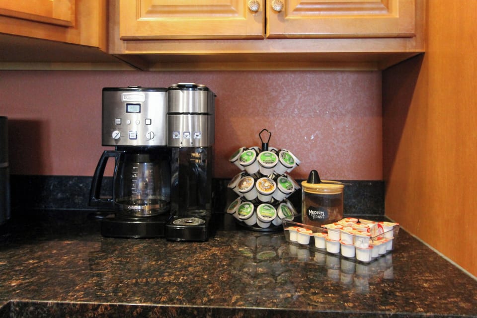 Both a drip coffee maker and Keurig, along with coffee grounds/filters & K-cups